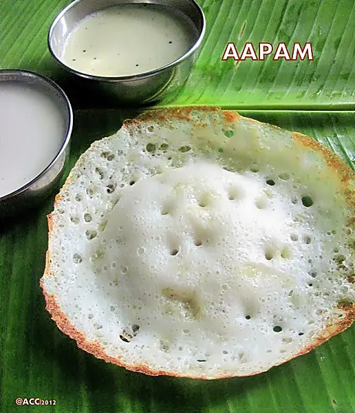 Appam recipe for breakfast served with coconut milk and stew.
