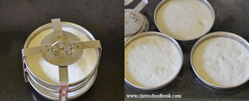 steaming idli in thatte idli plate with stand